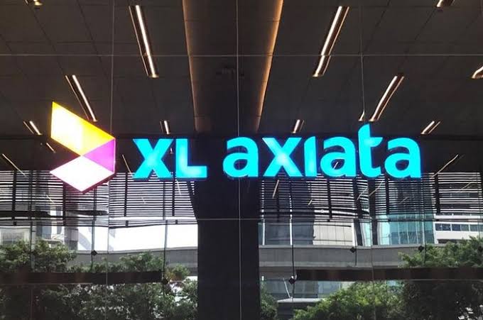 Dongkrak Kualitas Layanan dan Pejualan, XL Axiata Gandeng Grab dan Tokopedia