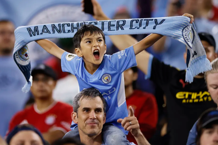 Manchester City Produksi Smart Scarf Buat The Citizens